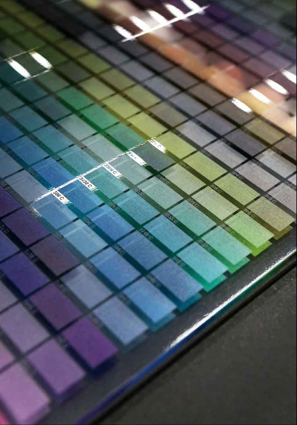 A diagonal arrangement of coloured glass samples