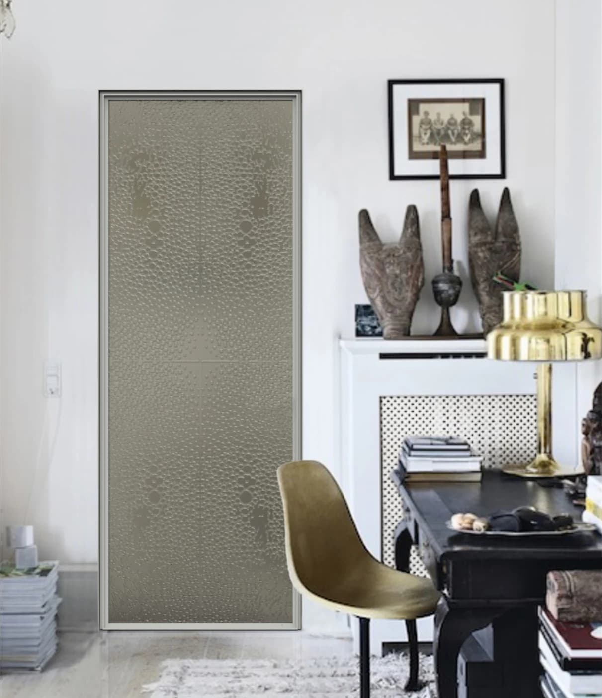 A patterned glass screen within an interior study