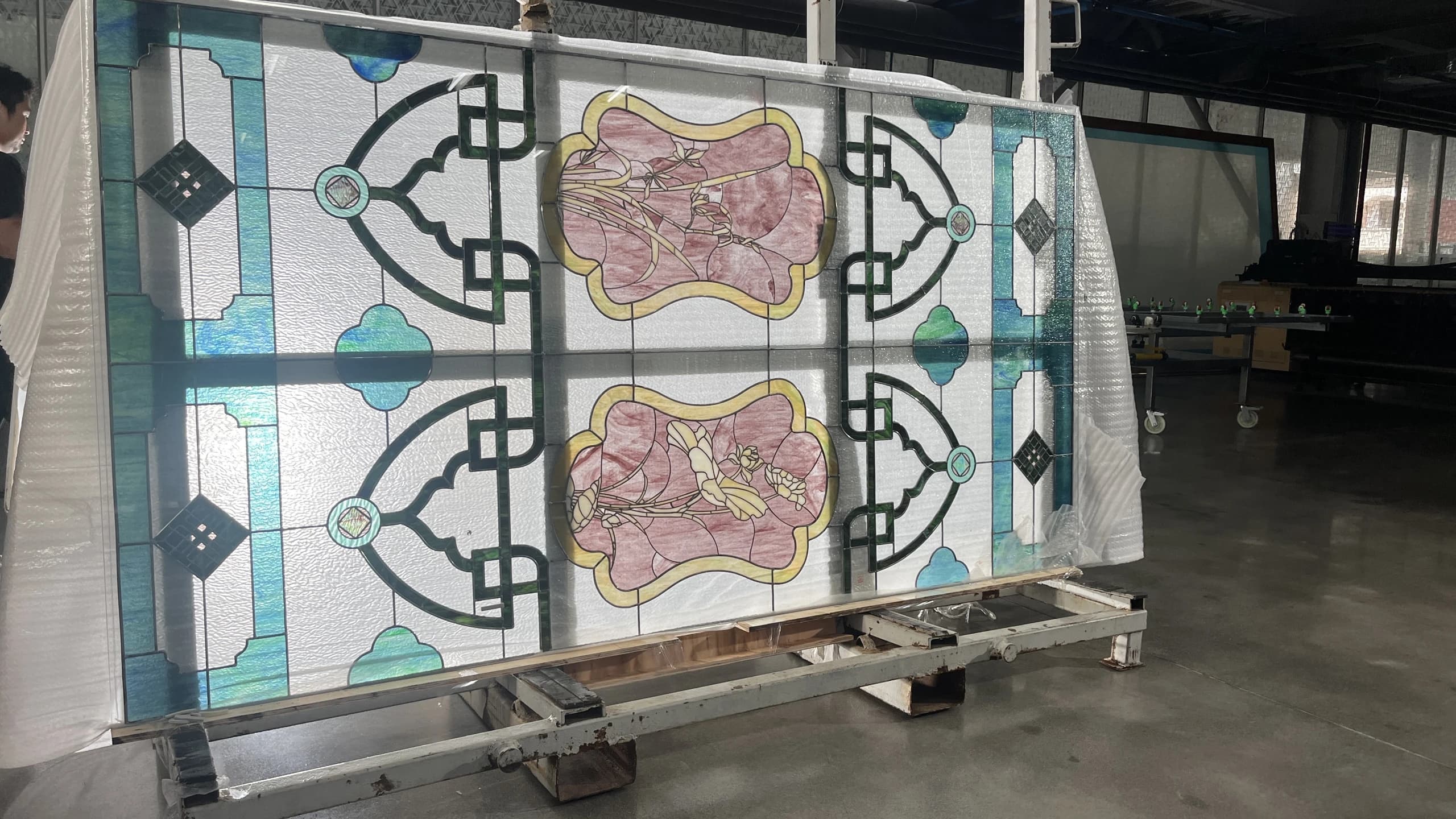Patterned glass panels on a workshop rack, supplied with phase one
