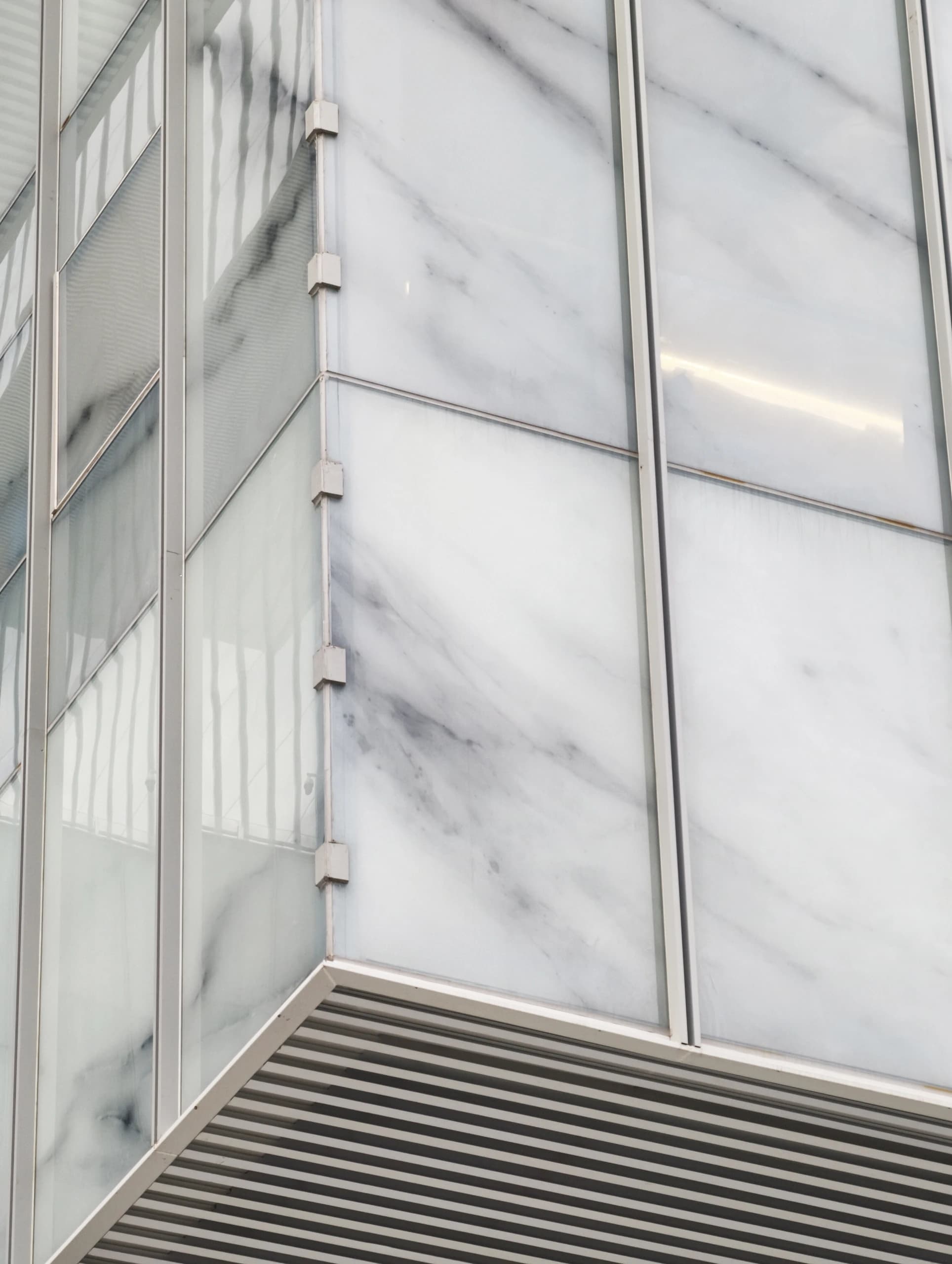 Veined translucent facade panels at a building corner